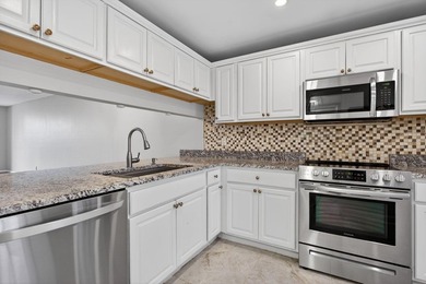 Move-in ready 2BR/2BA Palm Aire condo with expansive views. The