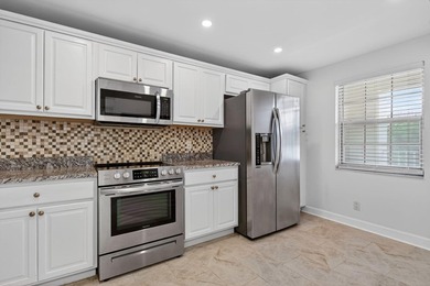 Move-in ready 2BR/2BA Palm Aire condo with expansive views. The