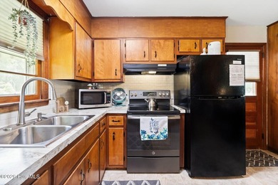 Charming, well-maintained brick home situated on a rare .79-acre - photo 13