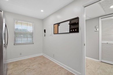 Move-in ready 2BR/2BA Palm Aire condo with expansive views. The