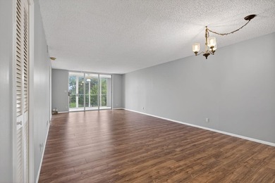 Move-in ready 2BR/2BA Palm Aire condo with expansive views. The
