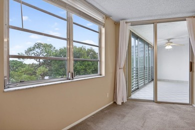Move-in ready 2BR/2BA Palm Aire condo with expansive views. The