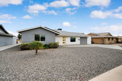NEWLY REPAINTED - Welcome to your fully remodeled, 3 bedroom (or - photo 2