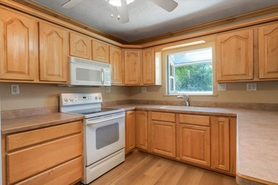 Welcome to this charming tri-level home nestled in a peaceful - photo 8