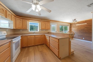 Welcome to this charming tri-level home nestled in a peaceful - photo 9