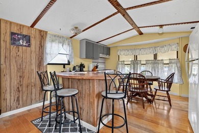 Enjoy the relaxed charm of Chincoteague Island from this - photo 8