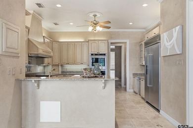 This extraordinary estate is located in the gated community of - photo 13