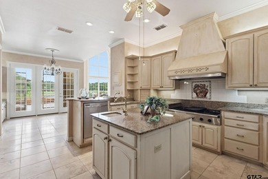 This extraordinary estate is located in the gated community of - photo 14