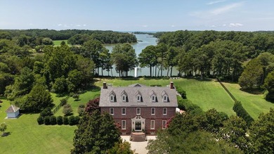 Majestically perched atop a high bluff on 2.31 acres at the head - photo 1