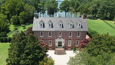 Majestically perched atop a high bluff on 2.31 acres at the head - photo 2