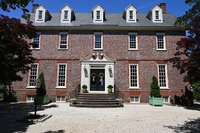 Majestically perched atop a high bluff on 2.31 acres at the head - photo 3