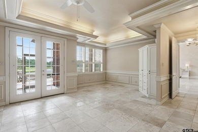 This extraordinary estate is located in the gated community of - photo 24