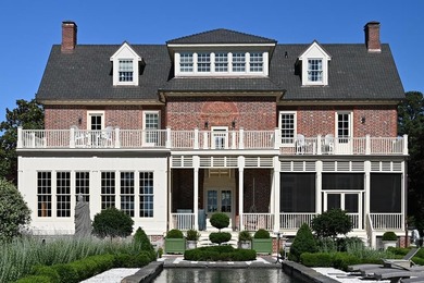 Majestically perched atop a high bluff on 2.31 acres at the head - photo 4