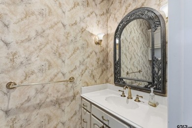 This extraordinary estate is located in the gated community of - photo 29