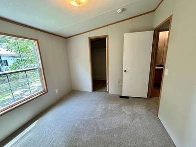 This 3-bedroom, 2-bathroom home is located on the outskirts of - photo 6