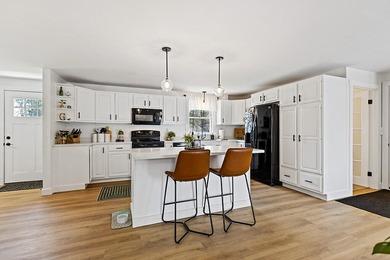 Well-kept and updated, this spacious home offers 2,256A+- square - photo 3