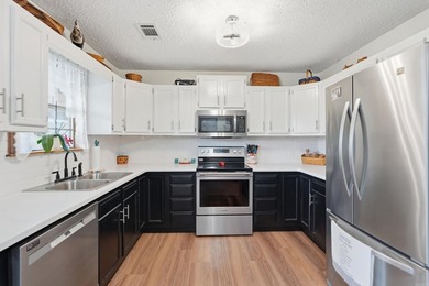Live where the music plays! This 1,486 sq ft, 3-bedroom, 3-bath - photo 27