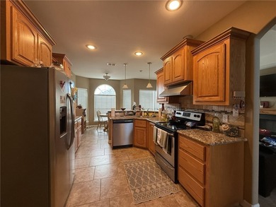 This beautiful custom-built 3-bedroom, 2.5-bath brick home sits - photo 6