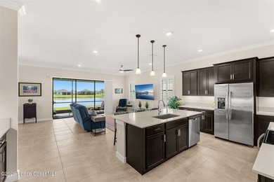 Enjoy waterfront living from this airy 3-bedroom, 4-bath home in - photo 5