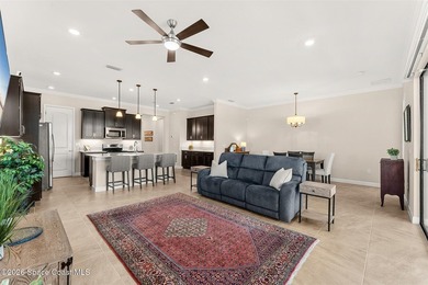 Enjoy waterfront living from this airy 3-bedroom, 4-bath home in - photo 7