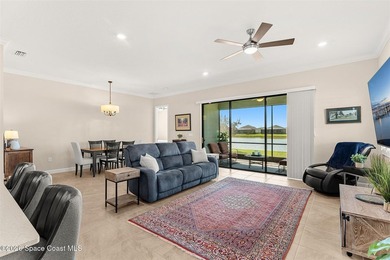 Enjoy waterfront living from this airy 3-bedroom, 4-bath home in - photo 8