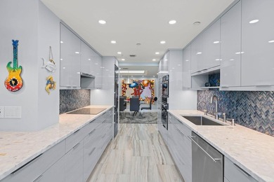 Experience elevated coastal living in this fully renovated - photo 18