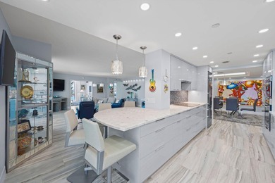 Experience elevated coastal living in this fully renovated - photo 19
