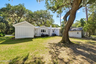 RARE FIND - Hidden beneath a canopy of majestic live oaks draped - photo 41