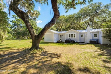 RARE FIND - Hidden beneath a canopy of majestic live oaks draped - photo 42