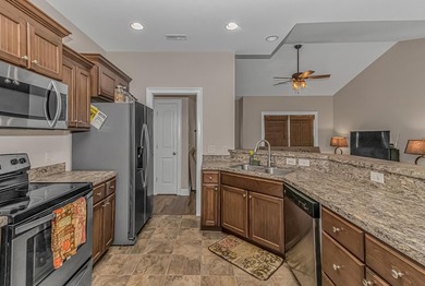 Welcome to this well-maintained 3-bedroom, 2-bath home located - photo 12