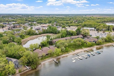 Welcome to this stunning lakefront end unit townhome nestled in - photo 3