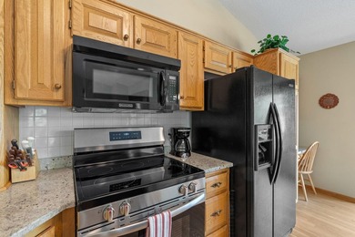 Welcome to this stunning lakefront end unit townhome nestled in - photo 9