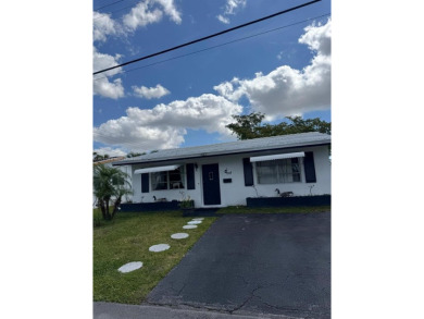 Lake Home For Sale in Tamarac, Florida