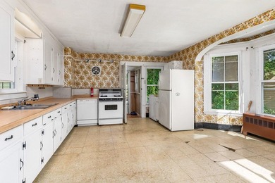 Welcome to 22 Rogers Road, a classic 1875 New Englander nestled - photo 4