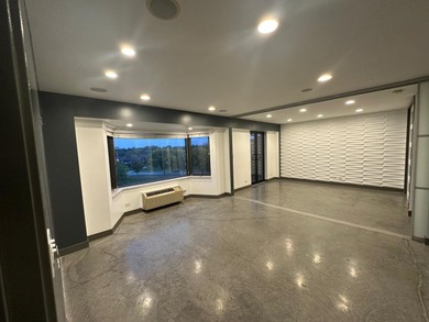 Modern loft-inspired living meets suburban convenience in this