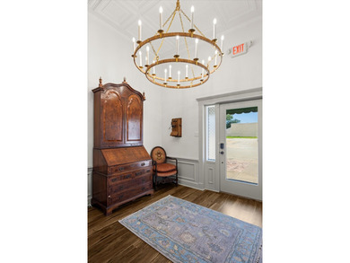 What an incredible opportunity to own a turnkey  on the historic - photo 3