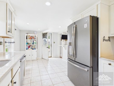 Nestled on 17 breathtaking acres, this enchanting 1910 farmhouse - photo 13