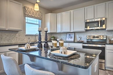 The Hanover is a modern raised ranch home featuring 3 bedrooms - photo 4
