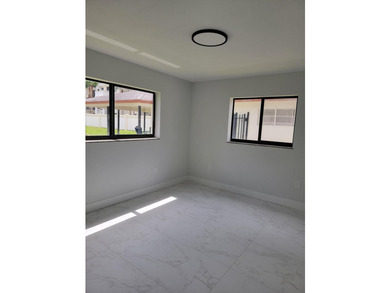 I am pleased to present this fully renovated, with new - photo 11