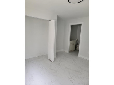 I am pleased to present this fully renovated, with new - photo 15
