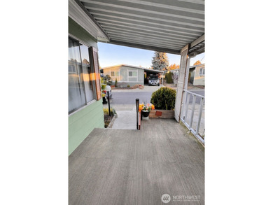 Welcome to this bright and airy manufactured home located in a