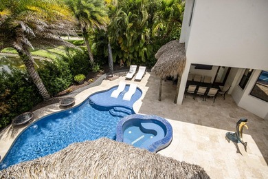 A private backyard paradise with a custom Van Kirk pool, tiki - photo 32