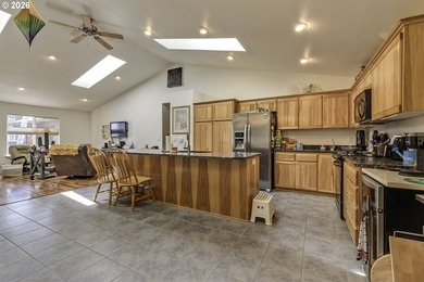 This inviting 3-bedroom, 2-bath home features an open-concept - photo 11