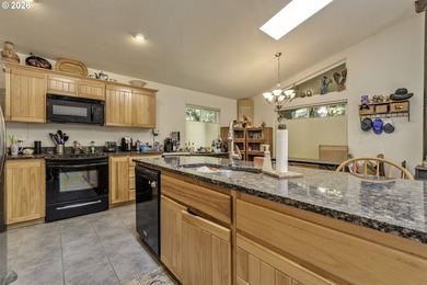 This inviting 3-bedroom, 2-bath home features an open-concept - photo 13