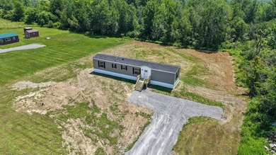 Welcome to easy, worry-free living in this brand-new 2-bedroom - photo 5