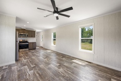 Welcome to easy, worry-free living in this brand-new 2-bedroom - photo 9
