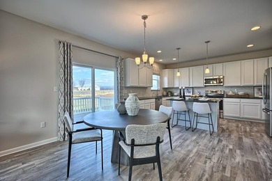 The Hamilton offered by Gemcraft Homes at Captains Cove. As you - photo 9