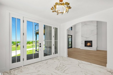 Commanding panoramic views of East Grand Traverse Bay from - photo 12