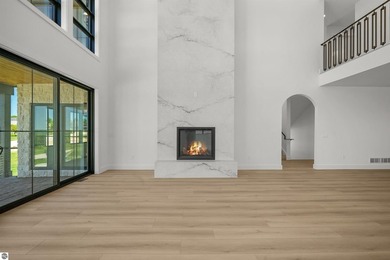 Commanding panoramic views of East Grand Traverse Bay from - photo 13