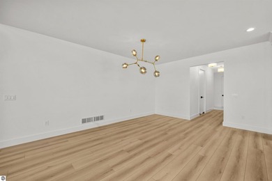 Commanding panoramic views of East Grand Traverse Bay from - photo 16